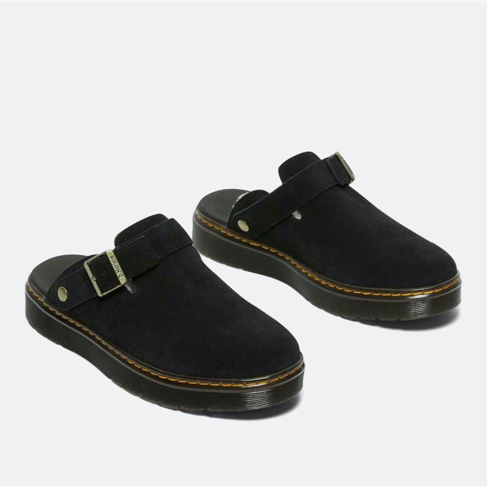 Doc Martens Carlson Mules. Never worn. Sherpa lined. Size 7.